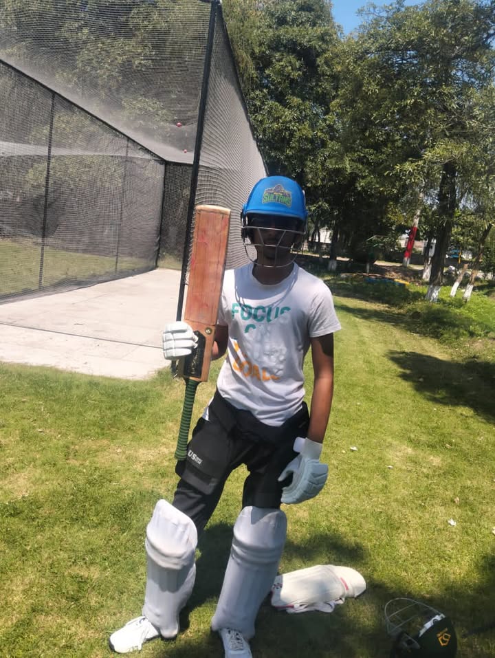 Students are giving trials for the cricket team under the supervision of PCB coach.